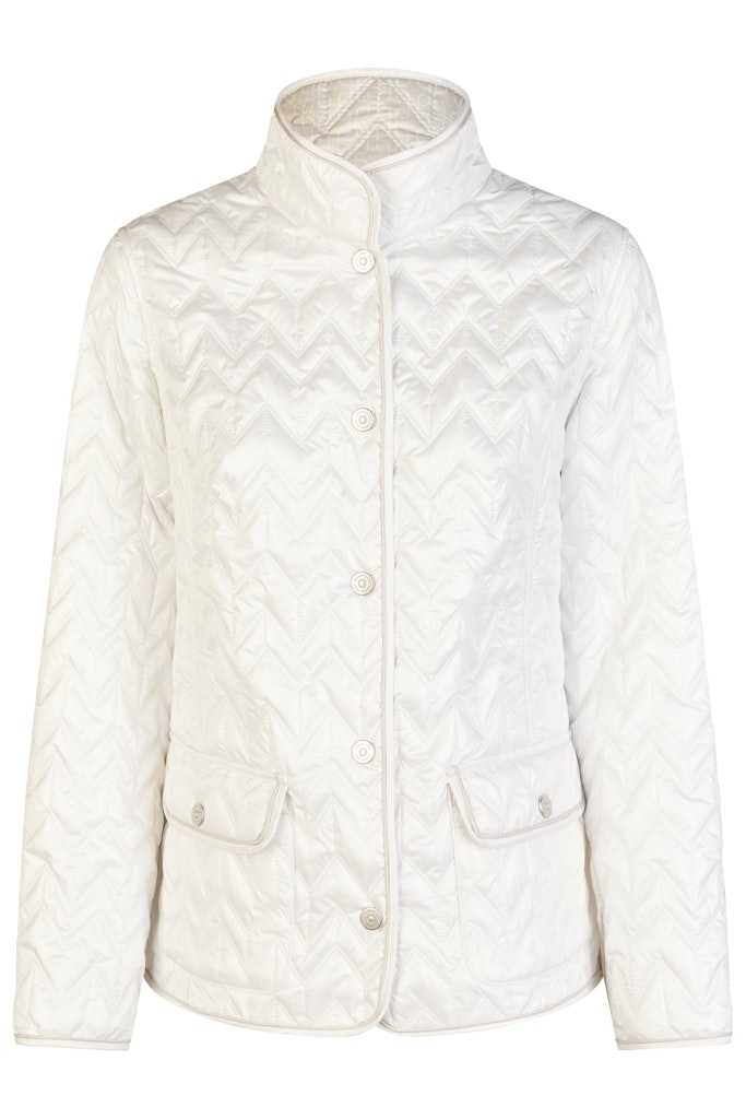 Voorzijde en detailopname van een dubbelzijdige Barbara Lebek damesjas in off white met drukknoopsluiting en zigzag-stiksel.