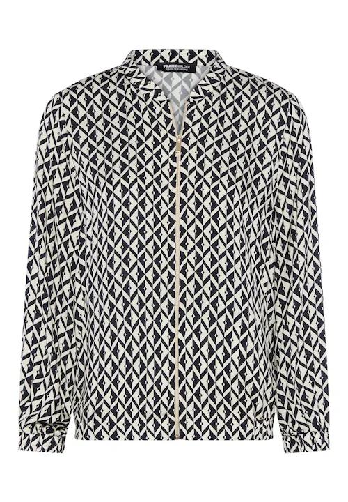 Frank Walder jasje met marineblauw en wit geometrisch ruitpatroon, ritssluiting en een elastische boord aan de onderzijde.