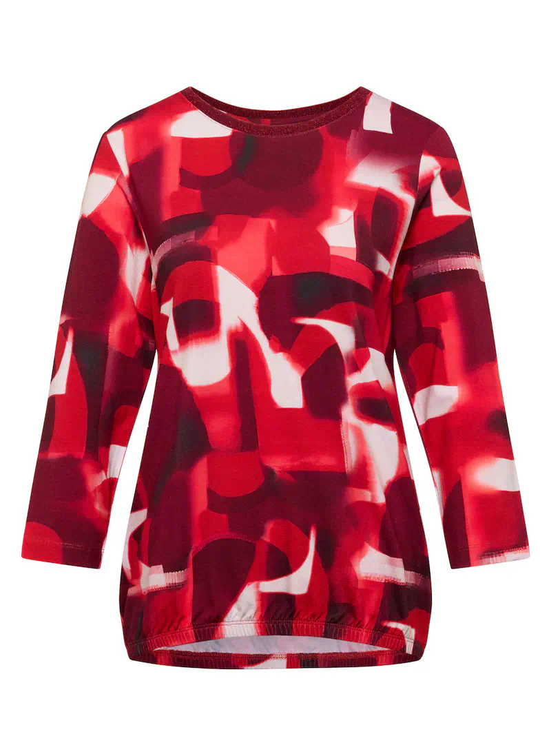 Rood geprinte Rabe dames blouson met een abstract dessin, driekwart mouwen, een ronde hals en een elastische boord aan de onderzijde op een witte achtergrond.